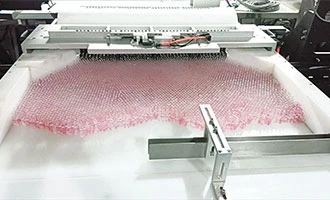 Automated packaging machine with conveyor system in industrial facility
